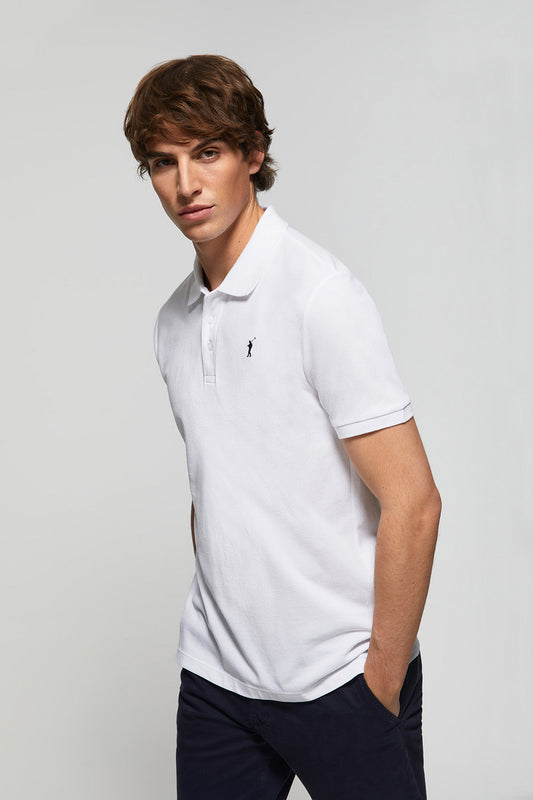 White pique polo shirt with three-button placket and contrast embroidered logo