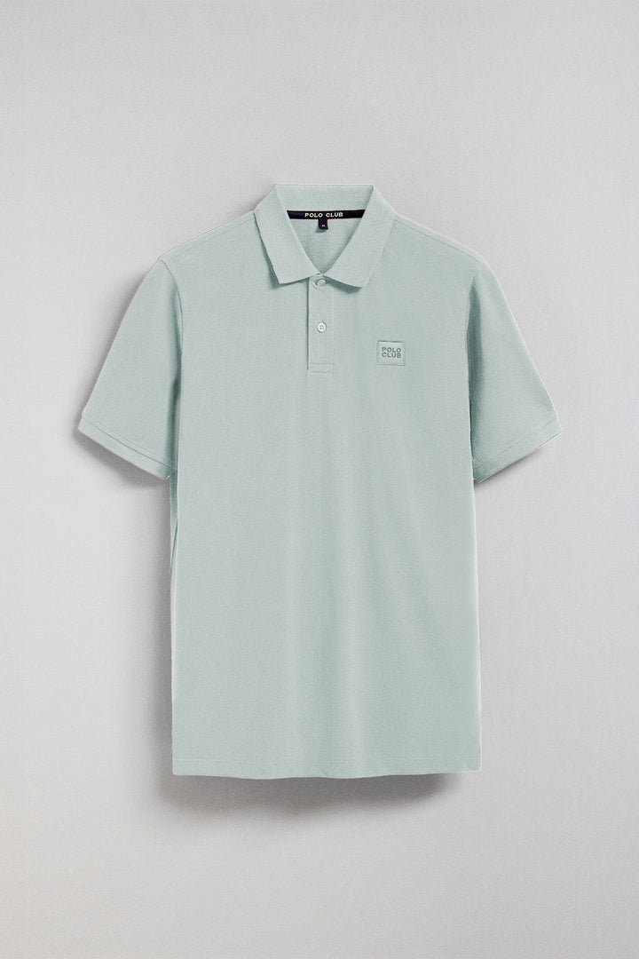 Greyish-blue two-button Portos polo shirt with Polo Club rubberised twill patch detail