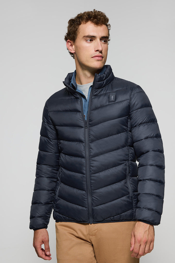 Veste Chase ultralight bleu marine avec écusson Rigby Go