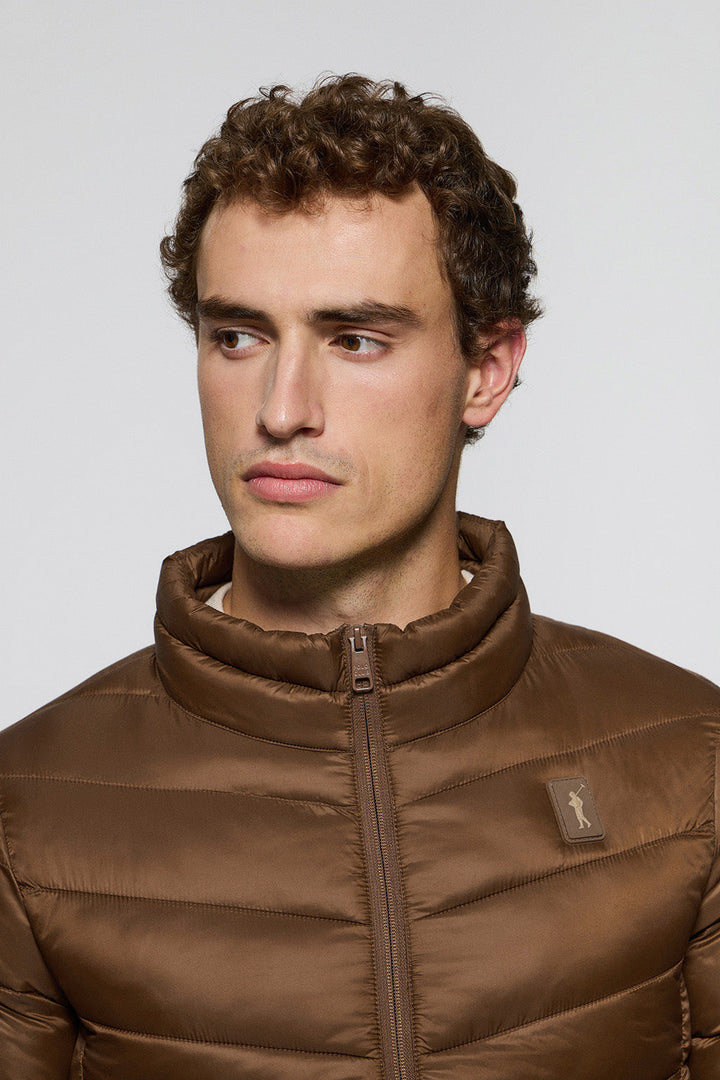 Brown ultralight jacket Chase with Rigby Go patch