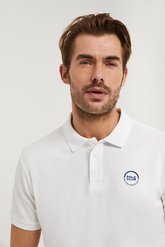 White pique polo shirt with three-button placket and gummed logo
