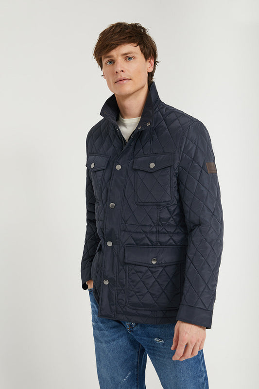 Navy-blue diamond-quilted jacket with pockets