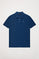 Indigo-blue pique polo shirt with three-button placket and contrast embroidered logo
