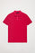 Fuchsia pique polo shirt with three-button placket and contrast embroidered logo
