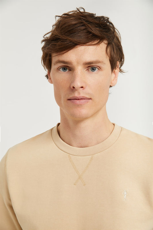 Basic zandkleurige sweater met ronde hals en Rigby Go-logo