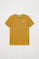 Organiczna koszulka Neutrals kids w kolorze ochry z krótkim rękawem i logo