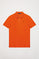 Piqué-Poloshirt orange mit Knopfleiste mit drei Knöpfen und Logo-Stickerei in Kontrastfarbe