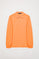Peach long-sleeve pique polo shirt with Rigby Go embroidery
