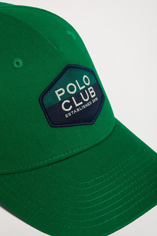 Green baseball cap with logo