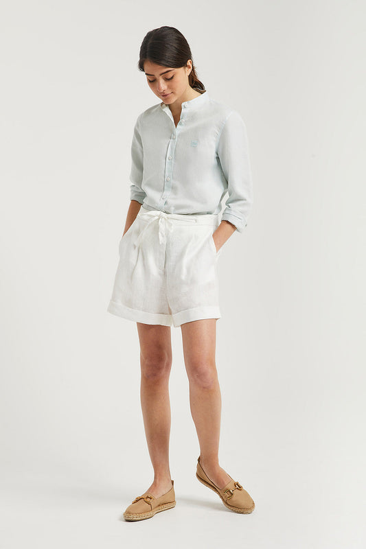 White linen shorts with embroidered detail