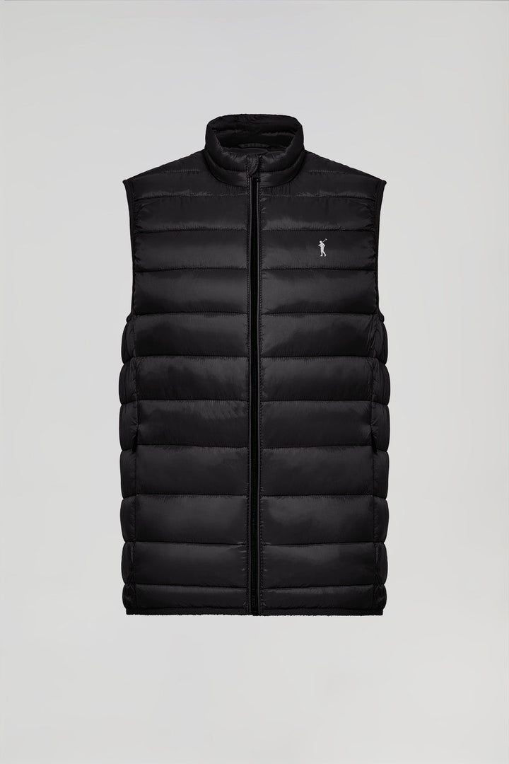 Black light puffer vest with Rigby Go print