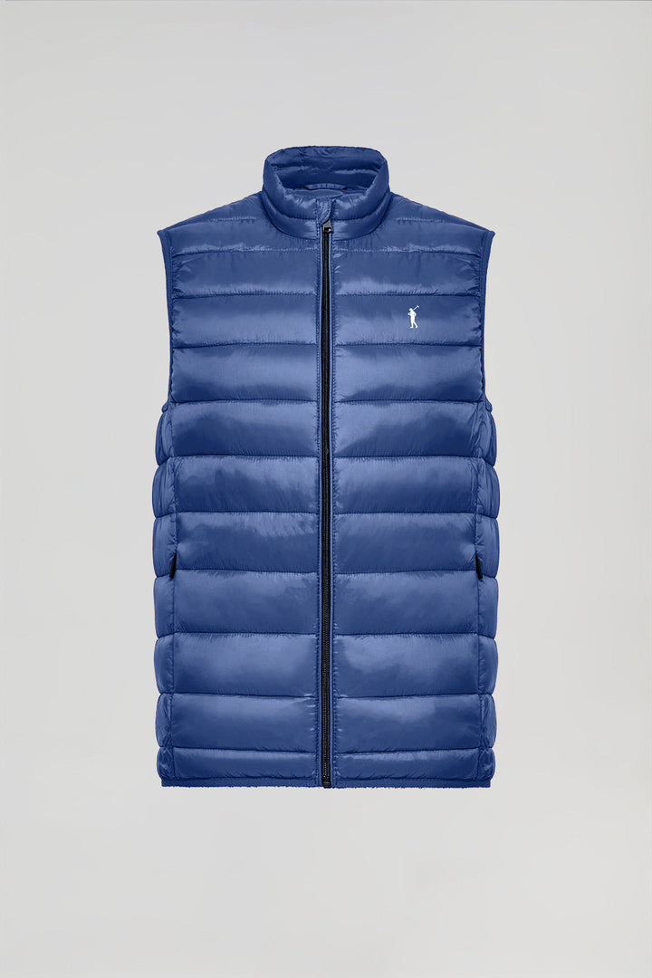 Blue light puffer vest with Rigby Go print